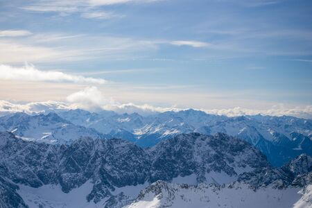 High alpine mountains with snow in Germany and blue beautiful sky