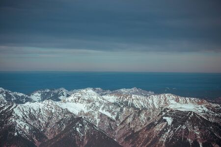 High alpine mountains with snow in Germany and blue beautiful skyの写真素材