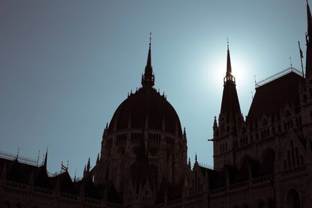 Budapest Parliament Building in the afternoon against a clear blue skyの写真素材