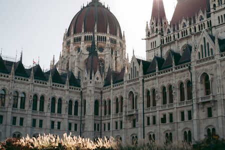 Budapest Parliament Building in the afternoon against a clear blue skyの写真素材