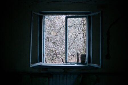 Old windows in the house in Pripyat in Chernobylの写真素材