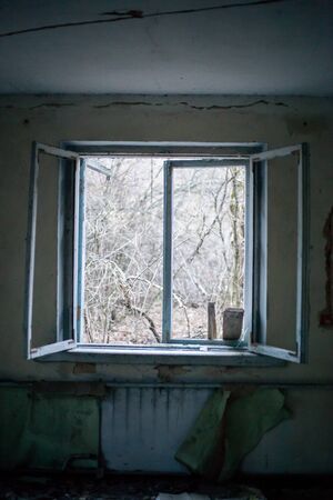 Old windows in the house in Pripyat in Chernobylの写真素材