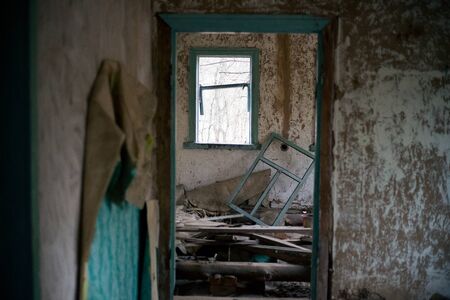 Old ruined house in Pripyat in Chernobyl