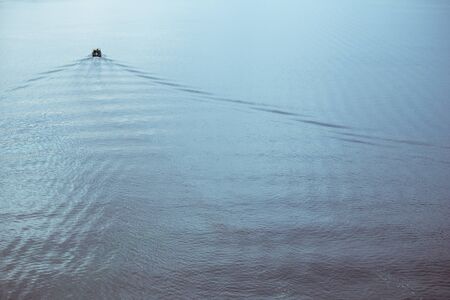 A guy and a girl canoe paddling the riverの写真素材
