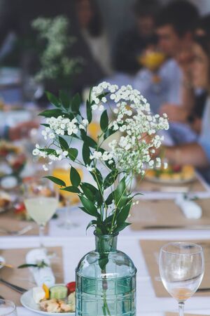Beautiful wedding decorated table with a white tablecloth