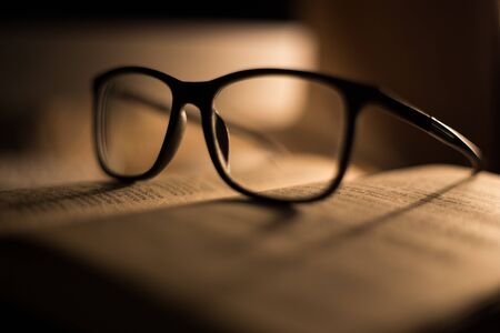 Glasses for sight and vision correction and protection from computer on the bookの写真素材