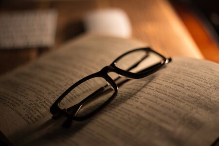 Glasses for sight and vision correction and protection from computer on the book