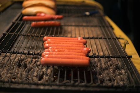 Delicious fresh hot dogs on the grillの写真素材