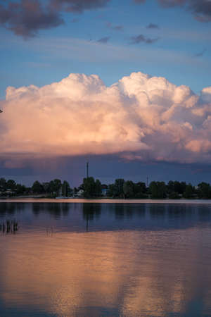 Beautiful magnificent clouds at sunset in the skyの写真素材