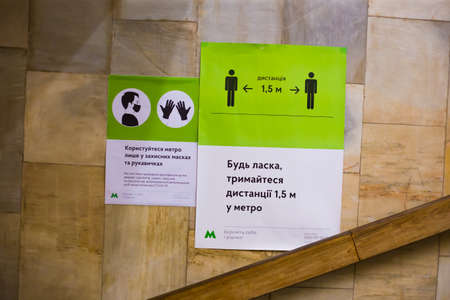 Kyiv, Ukraine - 06.24.2020: Social distance in the subway and information signs in the metroのeditorial素材
