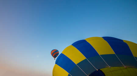 Big balloon flies against the skyの写真素材