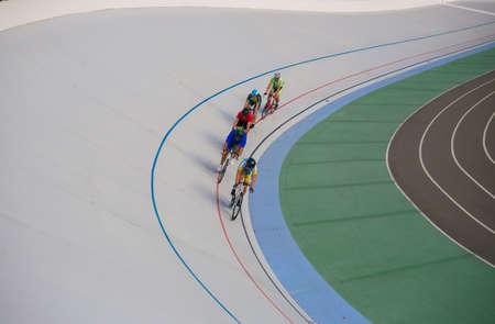 Kyiv, Ukraine 27.08.2020 - A man rides a bicycle on a track stadiumのeditorial素材