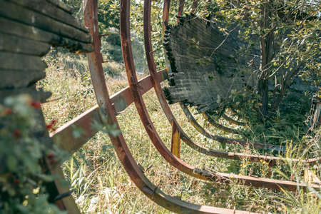 Old abandoned wooden bobsleigh track in summer by daylightの写真素材
