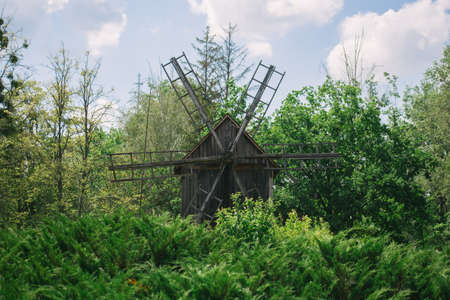 Old wooden mills surrounded by nature