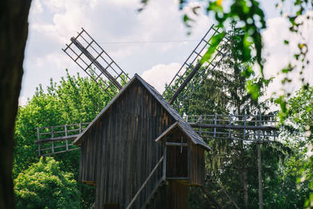 Old wooden mills surrounded by nature