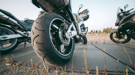 Kyiv, Ukraine 10.02.2020: Sports bike parked in a field under morning light
