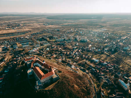 Aerial drone view of the medieval Palanok castle in the city of Mukachevo in western Ukraineの写真素材