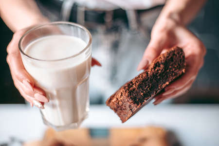 Freshly baked aromatic homemade cakes with a glass of milk