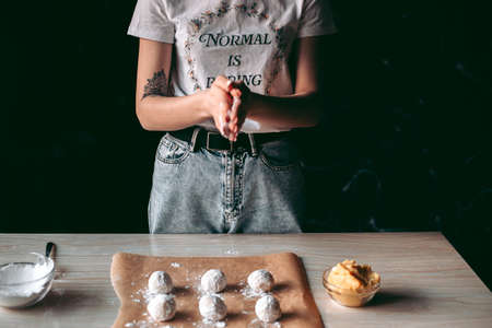 The baking process of baking pies and cookies in the kitchenの写真素材