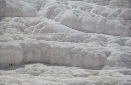 Carbonate mineral left by the flowing of thermal spring calcite-laden waters in Pamukkale