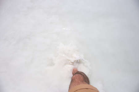 Top view of mens in muddy white water