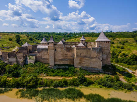 Aerial drone view of a medieval castle among the hills in summerの写真素材