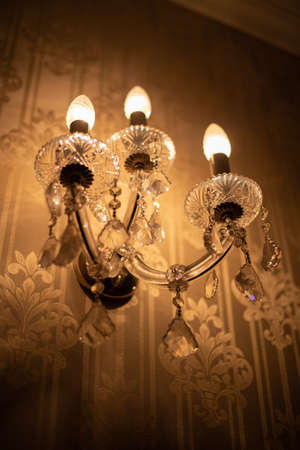 Expensive exquisite crystal chandelier in Victorian style indoor