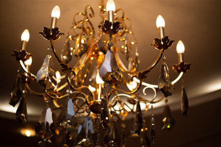 Expensive exquisite crystal chandelier in Victorian style indoorの写真素材