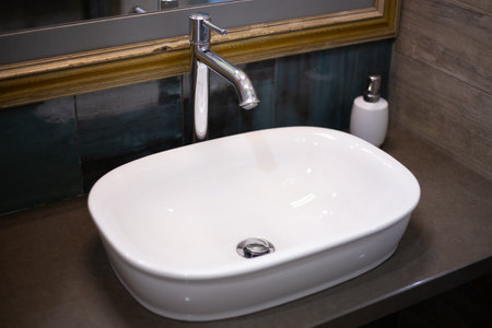 Washbasin with a sink in a modern bathroomの写真素材