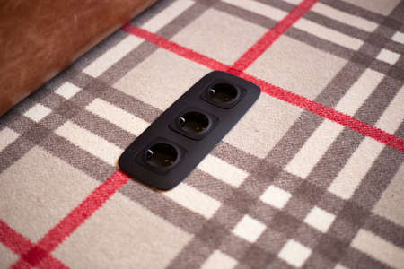 Socket for electrical appliances in a modern apartment inside the house