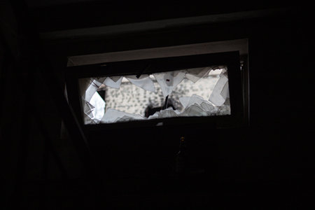 Broken windows in residential buildings in the city of Bucha in the Kyiv region after the Invasion...