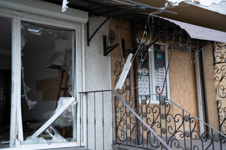 Borodyanka, Kyiv region 11.12.2022 The work of the mural of Banksy on the wall of a destroyed house