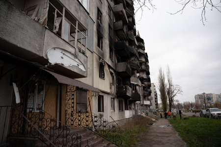 Borodyanka, Kyiv region 11.12.2022 The work of the mural of Banksy on the wall of a destroyed houseのeditorial素材