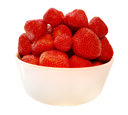Fresh, prepared strawberries in a bowl - isolated on white backgroundの写真素材