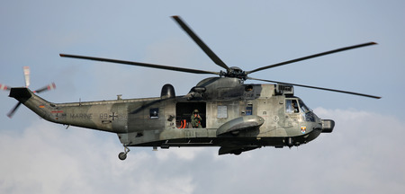 PORT WARNEMUENDE, GERMANY - AUGUST 09 Flight of military helicopter on 09 August, 2014 during the...