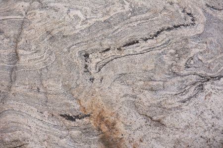 The texture of natural stone is brown.