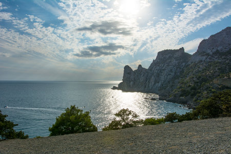 Summer Crimean landscape, juniper grove on the Black Sea coast on a sunny day, Golitsyn Trail, Novy Svet, Sudak, Crimea.の写真素材