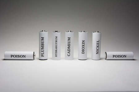 Battery on a white background. Battery for charging. Ecology. Harm to nature from batteries.の写真素材