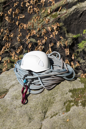 rope, helmet, carabiners are prepared for climbing in Saxon Switzerland (Lilienstein mountain), Koenigstein, Germanyの写真素材