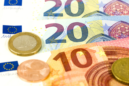 some euro bank notes and coinsの写真素材