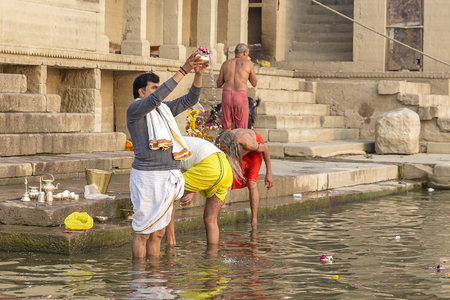 people sacrifice the Ganges river, Varanasi, Uttar Pradesh, Indiaの写真素材
