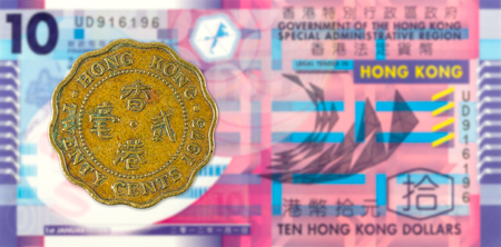 20 hong kong cent coin (1975) against 10 hong kong dollar bank note obverseの写真素材