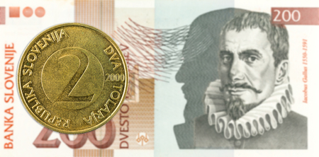 2 slovenian tolar coin against 200 slovenian tolar banknote obverse