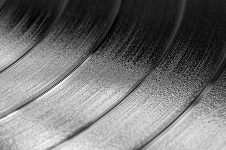close-up of a black retro record surfaceの写真素材