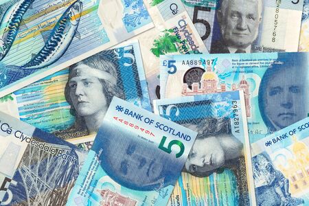 some different 5 Pounds Sterling banknotes issued by Scottish Banksの写真素材