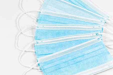 some surgical masks isolated on white background