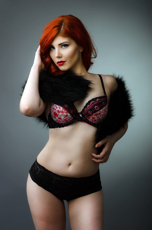 Sensual plus size model posing in sexy lingerieの写真素材