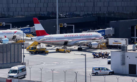 Austrian Airline plane at Vienna International Airport Terminal