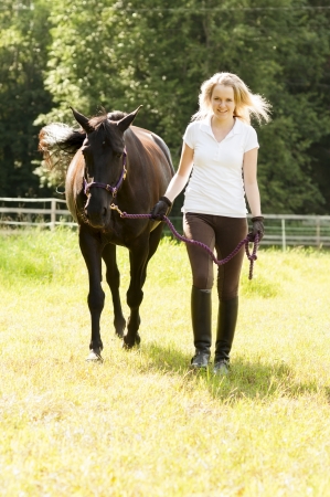Portrait of female horse rider and horseの写真素材
