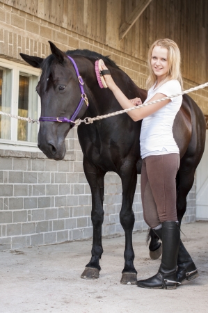 Portrait of female horse rider and horseの写真素材